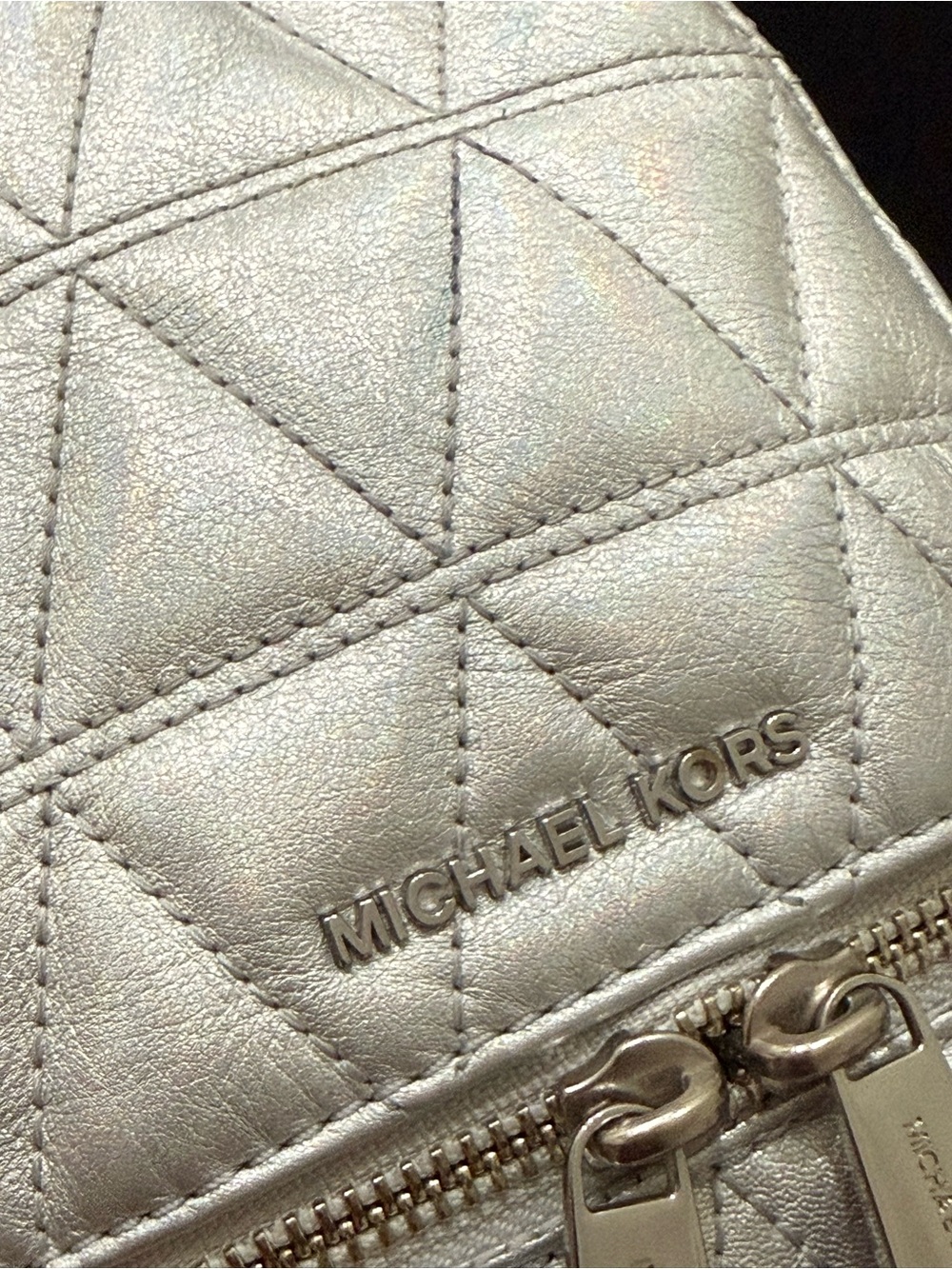 MICHAEL KORS Rhea Mini Silver Metallic Quilted Leather Mini Backpack
EUC - Picture 7 of 16